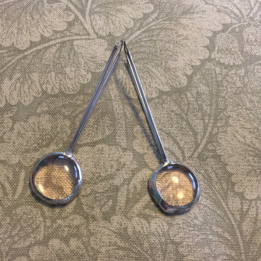 Silver earrings with very light pink glass bauble.